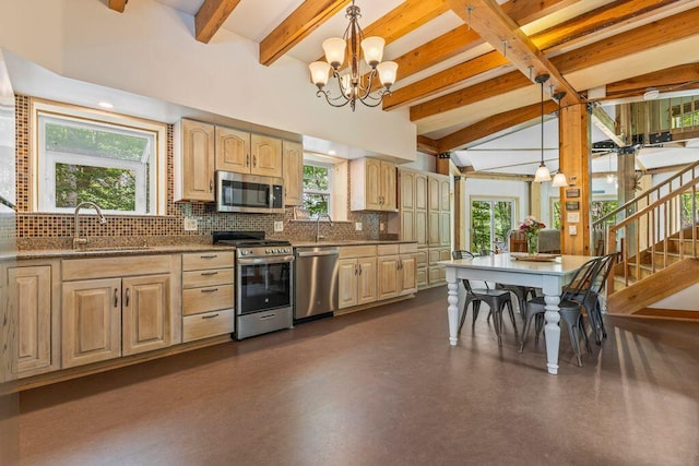 22 Woodpecker Ln, Embden, ME 04958 - kitchen featuring stainless steel appliances, decorative backsplash, a chandelier, light brown cabinetry, and decorative light fixtures