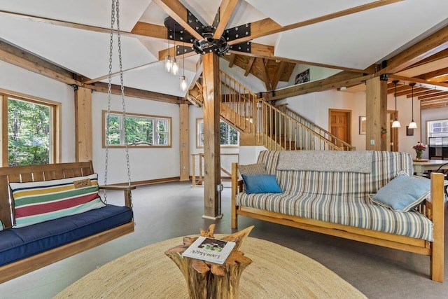 22 Woodpecker Ln, Embden, ME 04958 - carpeted living room with stairs and baseboards