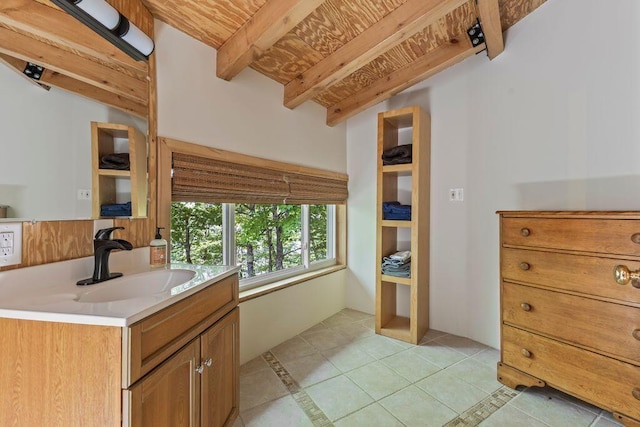 22 Woodpecker Ln, Embden, ME 04958 - bathroom featuring vanity, a wood ceiling with exposed beams, and tile patterned flooring