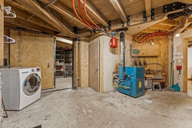 22 Woodpecker Ln, Embden, ME 04958 - unfinished basement featuring washer / clothes dryer and a heating unit