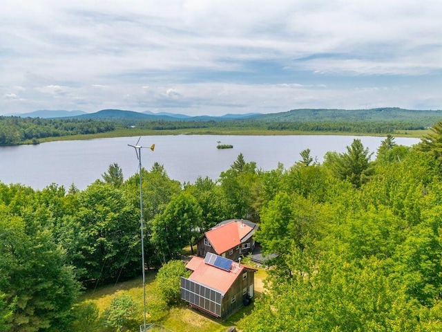 22 Woodpecker Ln, Embden, ME 04958 - drone / aerial view of a water and mountain view and a heavily wooded area