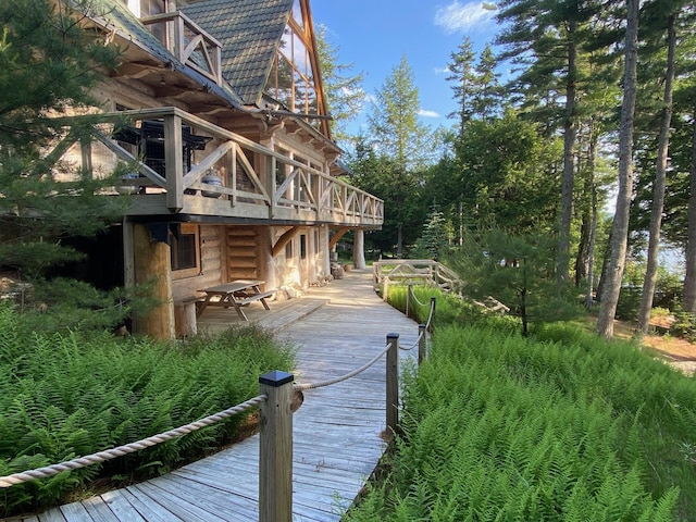 378 Black Point Rd, Beaver Cove, ME 04441 - rear view of property with a deck