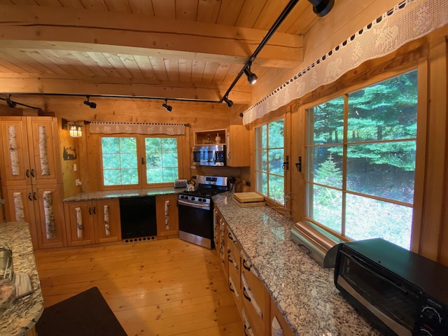 378 Black Point Rd, Beaver Cove, ME 04441 - kitchen featuring track lighting, stainless steel appliances, a wood ceiling with exposed beams, light wood-type flooring, and light stone countertops