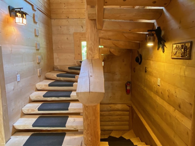 378 Black Point Rd, Beaver Cove, ME 04441 - stairs featuring wood walls