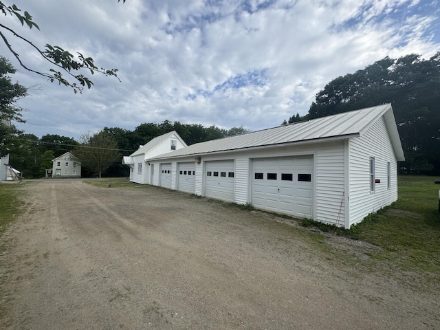 205 Bangor Rd, Unity, ME 04988 - detached garage featuring driveway