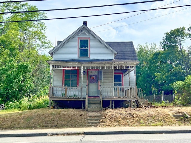 363 Lisbon St, Lisbon, ME 04250 - view of front of house featuring a porch