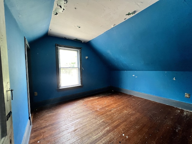 363 Lisbon St, Lisbon, ME 04250 - additional living space featuring wood-type flooring and vaulted ceiling
