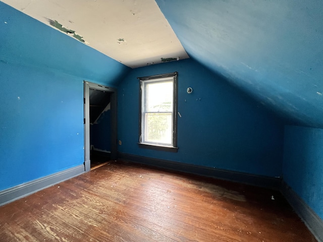 363 Lisbon St, Lisbon, ME 04250 - additional living space with vaulted ceiling and wood-type flooring