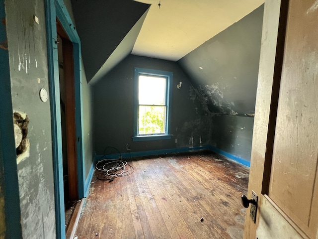 363 Lisbon St, Lisbon, ME 04250 - additional living space with hardwood / wood-style floors and vaulted ceiling