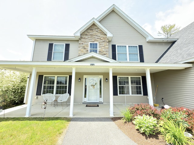 8 Clark Cir, Hampden, ME 04444 - view of front facade featuring a porch