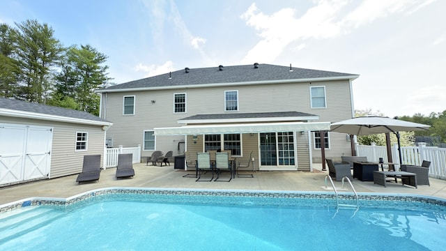 8 Clark Cir, Hampden, ME 04444 - back of house featuring a patio area, outdoor dining space, and an outdoor structure
