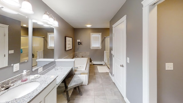 8 Clark Cir, Hampden, ME 04444 - bathroom featuring a shower stall, baseboard heating, vanity, and a bath