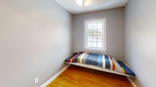 8 Clark Cir, Hampden, ME 04444 - bedroom with baseboards and light wood-style flooring
