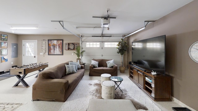 8 Clark Cir, Hampden, ME 04444 - living area with a garage, healthy amount of natural light, and electric panel