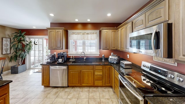 8 Clark Cir, Hampden, ME 04444 - kitchen with stainless steel appliances, healthy amount of natural light, recessed lighting, and light tile patterned floors