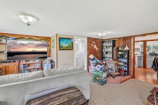 350 Cushing Rd, Cushing, ME 04563 - living area with carpet and brick wall