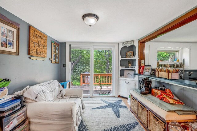 350 Cushing Rd, Cushing, ME 04563 - living area featuring healthy amount of natural light and wood finished floors