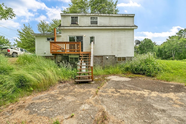 350 Cushing Rd, Cushing, ME 04563 - back of property with a wooden deck and stairway