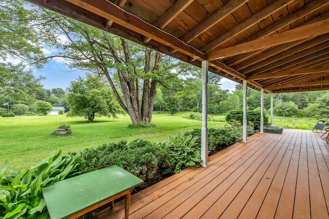 350 Cushing Rd, Cushing, ME 04563 - deck featuring a lawn and view of wooded area