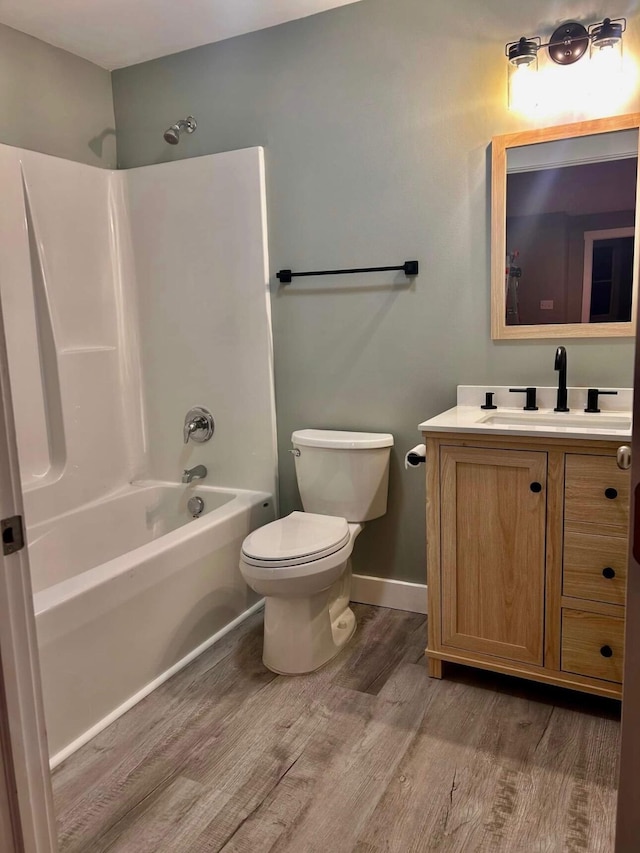 42 Applehead Way, Orrington, ME 04474 - bathroom featuring wood finished floors, vanity, and tub / shower combination