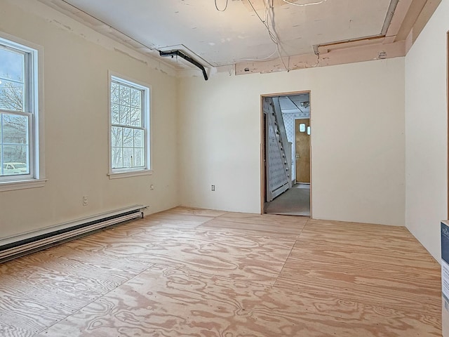 35 Washington St, Rumford, ME 04276 - spare room featuring a baseboard radiator