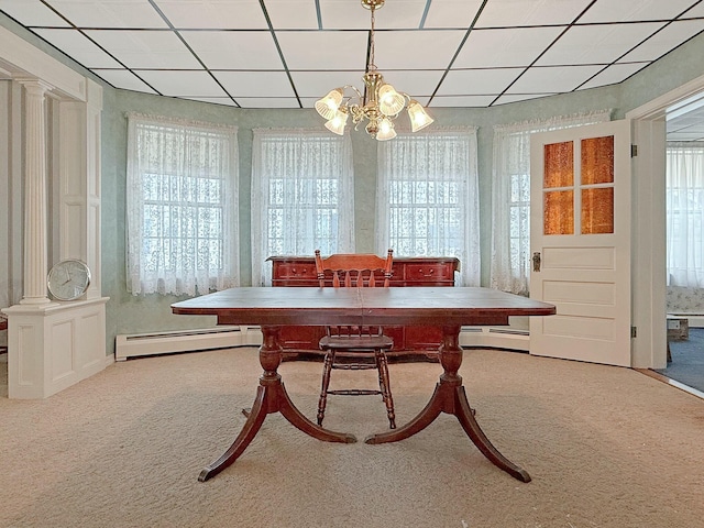 35 Washington St, Rumford, ME 04276 - carpeted dining area featuring plenty of natural light, a baseboard heating unit, a chandelier, and a paneled ceiling