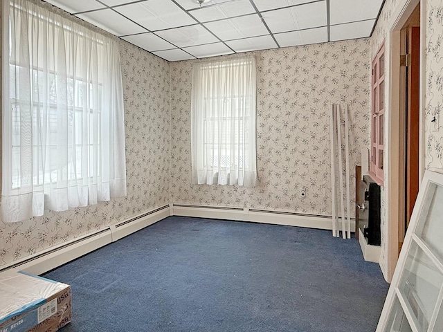 35 Washington St, Rumford, ME 04276 - carpeted spare room with wallpapered walls and a paneled ceiling