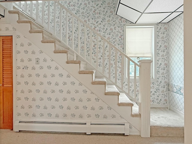 35 Washington St, Rumford, ME 04276 - stairs with wallpapered walls, baseboard heating, and carpet