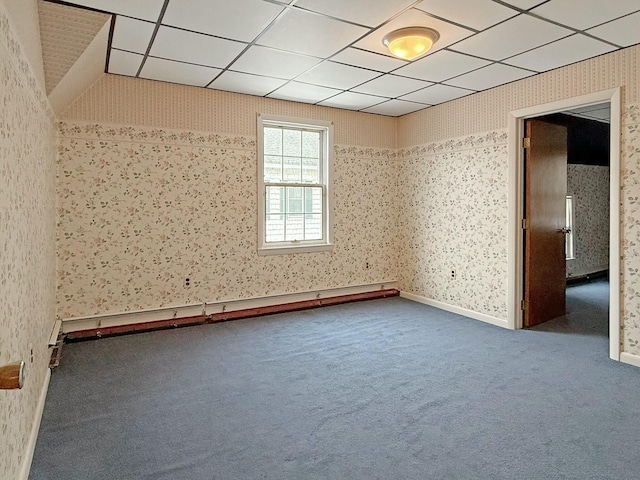 35 Washington St, Rumford, ME 04276 - empty room with wallpapered walls, carpet floors, and a drop ceiling