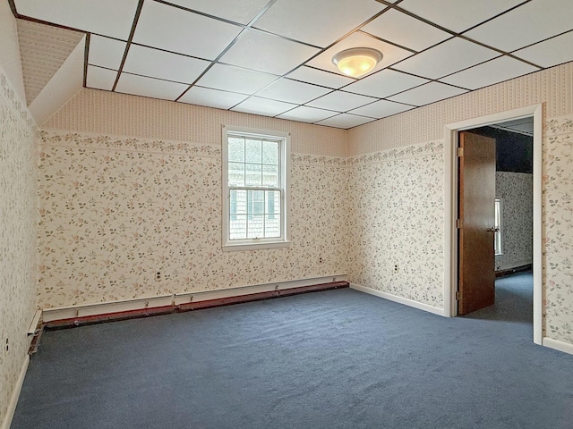 35 Washington St, Rumford, ME 04276 - spare room with wallpapered walls, carpet flooring, and a drop ceiling