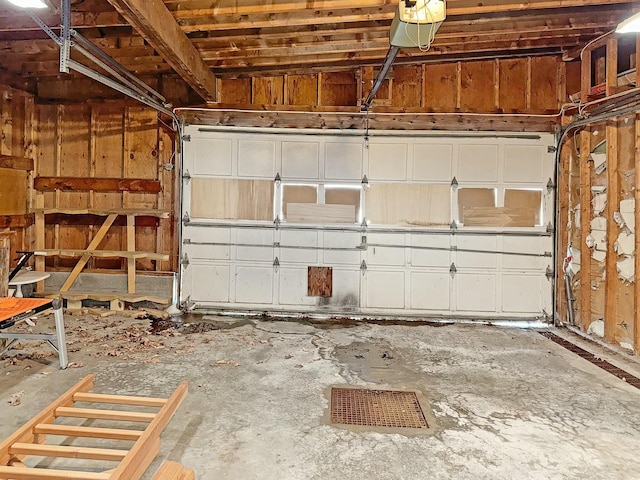 35 Washington St, Rumford, ME 04276 - garage featuring a garage door opener