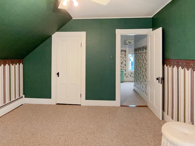 35 Washington St, Rumford, ME 04276 - additional living space with vaulted ceiling, carpet floors, ceiling fan, and baseboard heating
