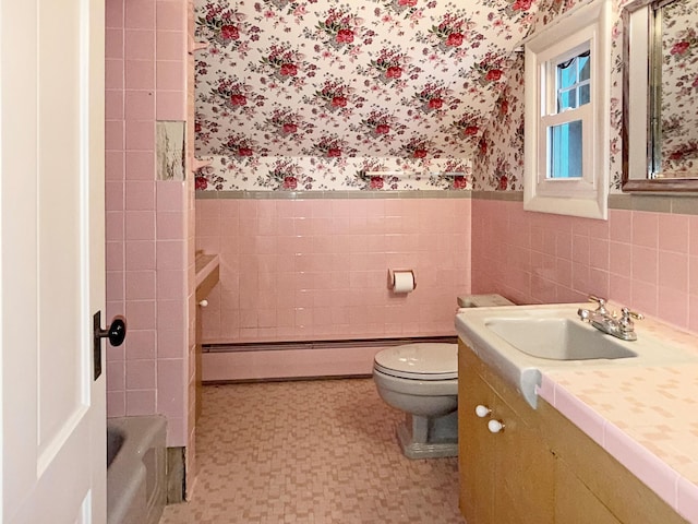 35 Washington St, Rumford, ME 04276 - bathroom with wallpapered walls, a wainscoted wall, vanity, tile patterned floors, and a baseboard radiator