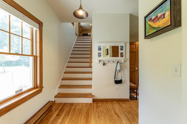 270 Park St, Rockport, ME 04856 - stairway with baseboard heating and wood finished floors