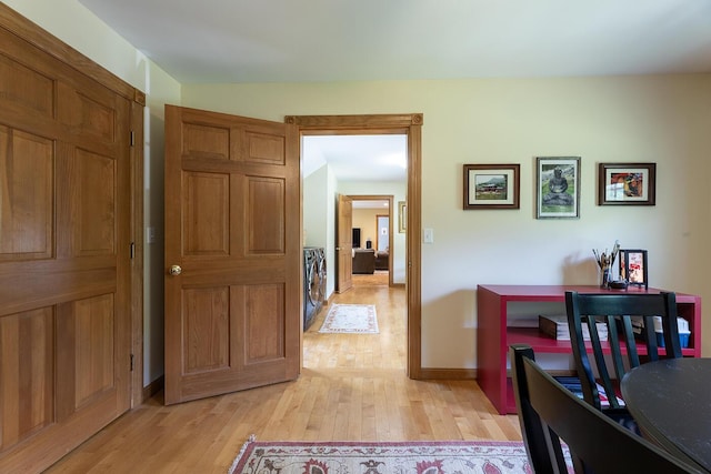 270 Park St, Rockport, ME 04856 - hall featuring light wood-style floors and washer and clothes dryer
