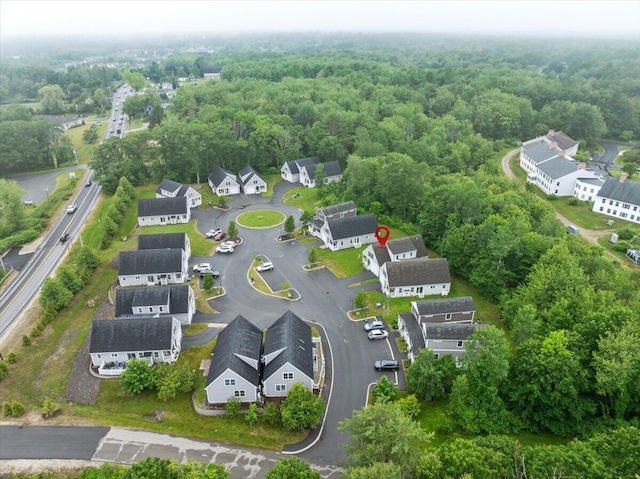 7 Coastal Woods Dr Unit 102, Kennebunk, ME 04043 - aerial perspective of suburban area with a heavily wooded area