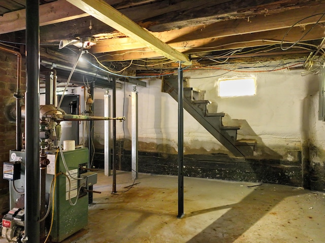 9 Coolidge St, Livermore, ME 04253 - below grade area with stairway and a heating unit