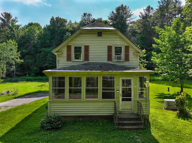 9 Coolidge St, Livermore, ME 04253 - view of front of house with a front lawn and roof with shingles