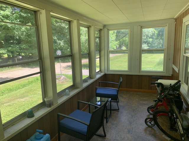 9 Coolidge St, Livermore, ME 04253 - sunroom / solarium featuring plenty of natural light and wooden walls