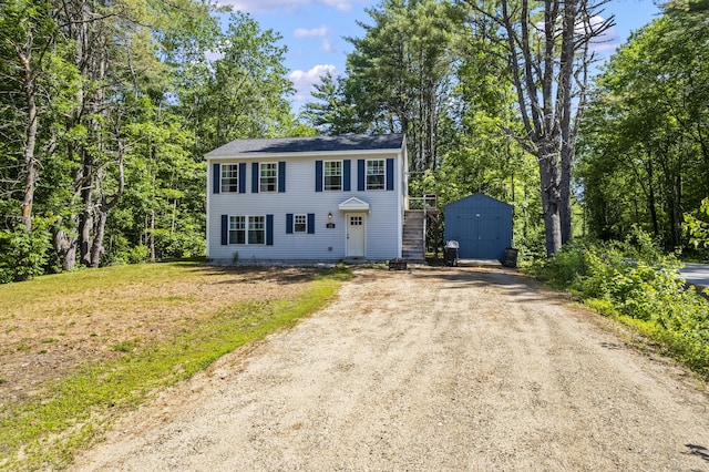 152 Quarry Rd, Limerick, ME 04048 - colonial-style house with a shed and dirt driveway
