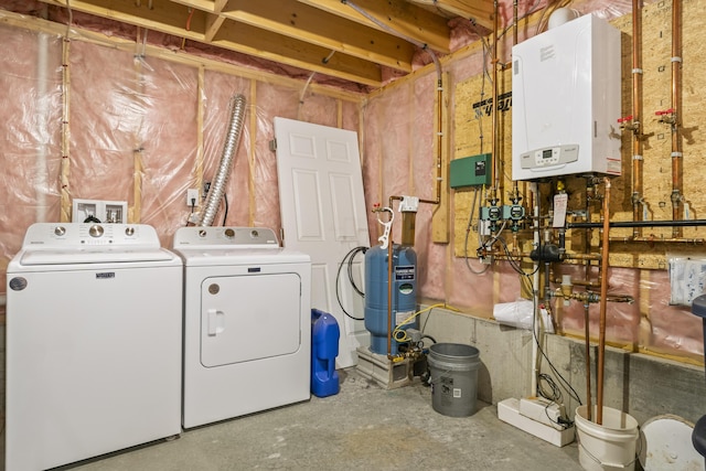 152 Quarry Rd, Limerick, ME 04048 - washroom featuring tankless water heater and washer and dryer