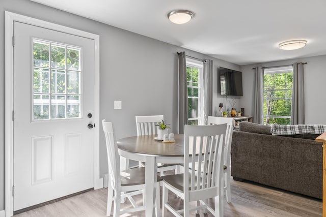 152 Quarry Rd, Limerick, ME 04048 - dining room with light wood-style flooring and plenty of natural light