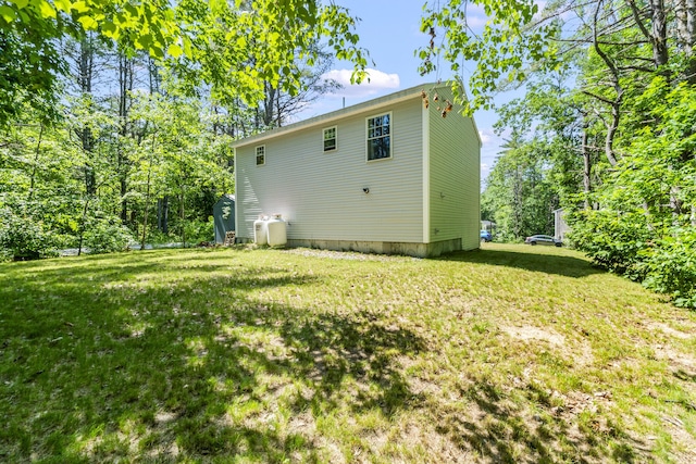 152 Quarry Rd, Limerick, ME 04048 - back of house with a lawn and a shed