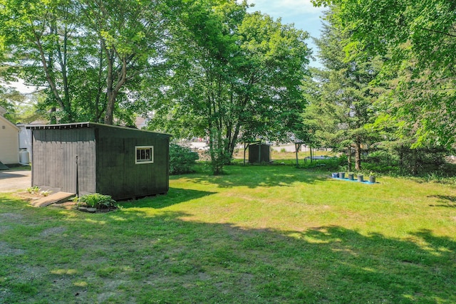 47 Main Rd N, Hampden, ME 04444 - view of grassy yard with a shed