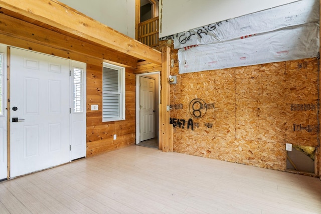 30 Cogliandro Dr, Acton, ME 04001 - foyer entrance featuring wood walls and wood finished floors
