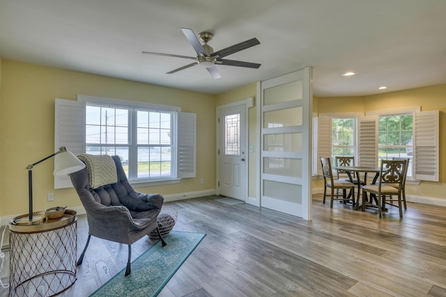 2 Church St, Deer Isle, ME 04627 - sitting room with ceiling fan, wood finished floors, and recessed lighting