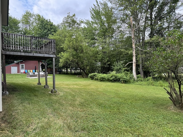 24 N Tiery St, Old Town, ME 04468 - view of green lawn featuring a deck