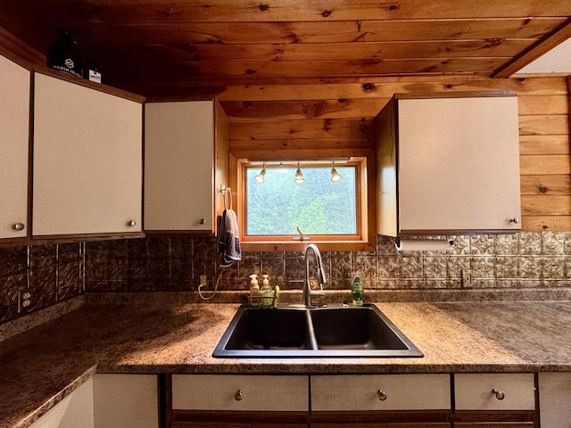 24 N Tiery St, Old Town, ME 04468 - kitchen with wooden ceiling, white cabinets, and backsplash
