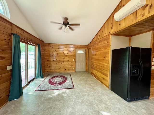 24 N Tiery St, Old Town, ME 04468 - unfurnished living room featuring lofted ceiling, ceiling fan, and wood walls