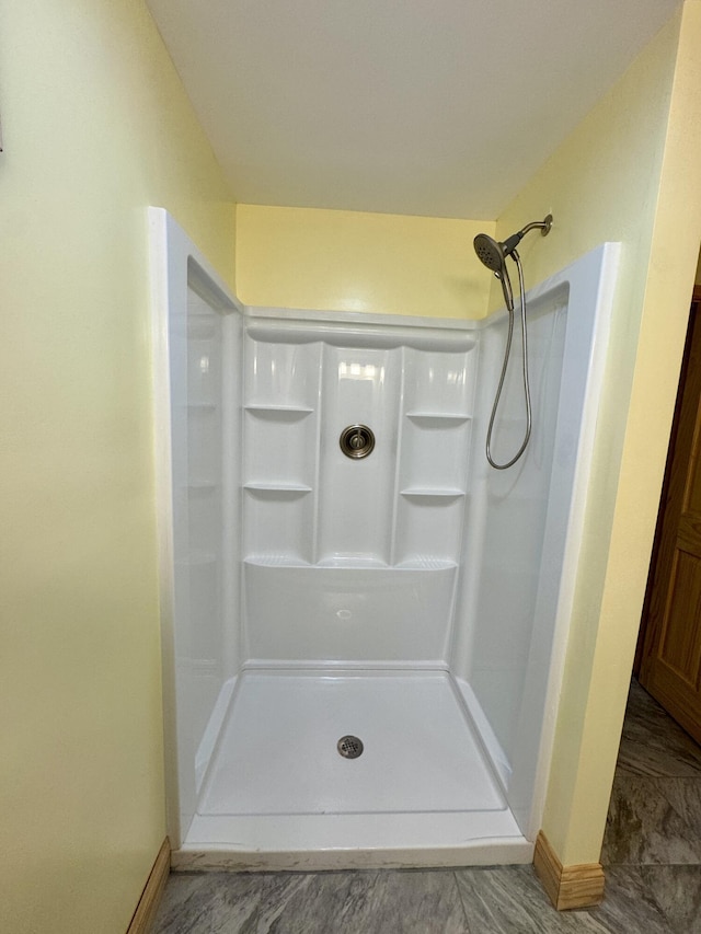 24 N Tiery St, Old Town, ME 04468 - bathroom with a shower and baseboards